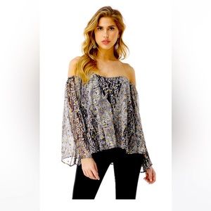 Sky Cadogan off the shoulder top